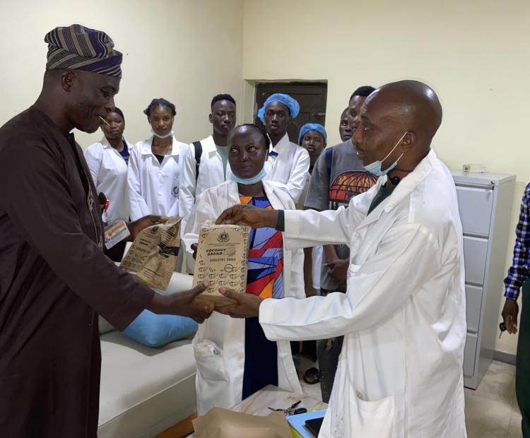 COCONUT BREAD PRESENTATION to Deputy Vice-Chancellor (Academics and Innovation)